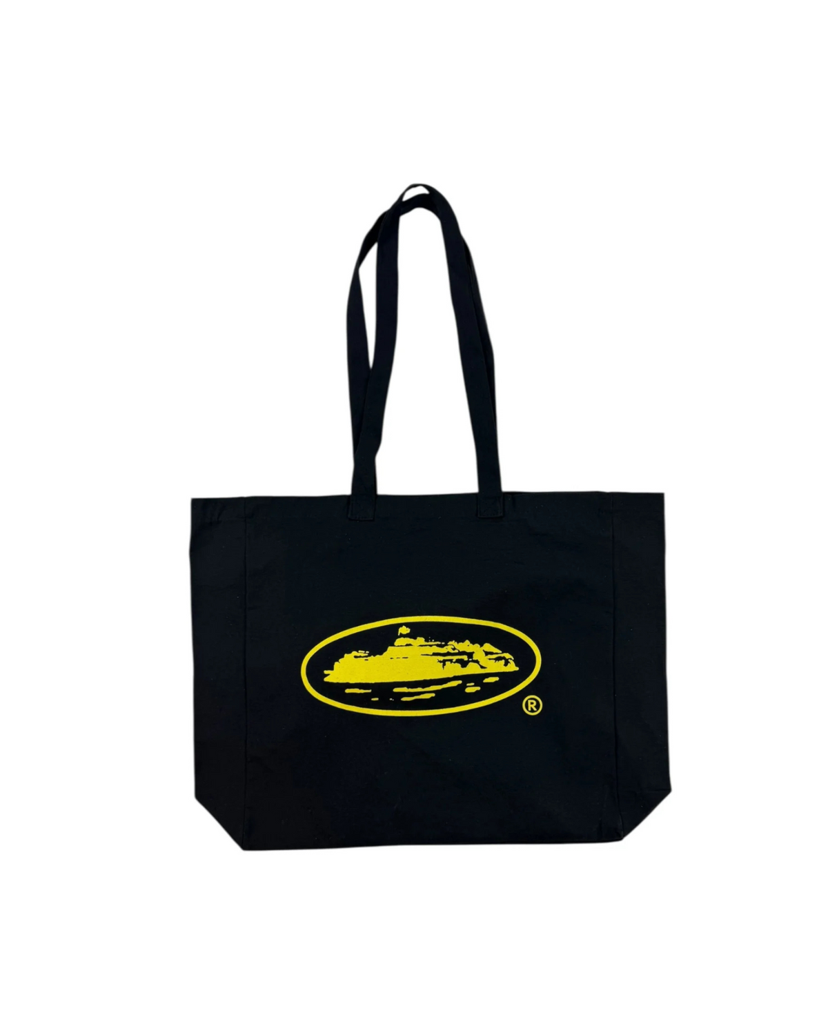Musta Corteiz Honey Tote Bag x Nike pitkillä kantohihnoilla ja keltaisella soikeaLogolla edestä.