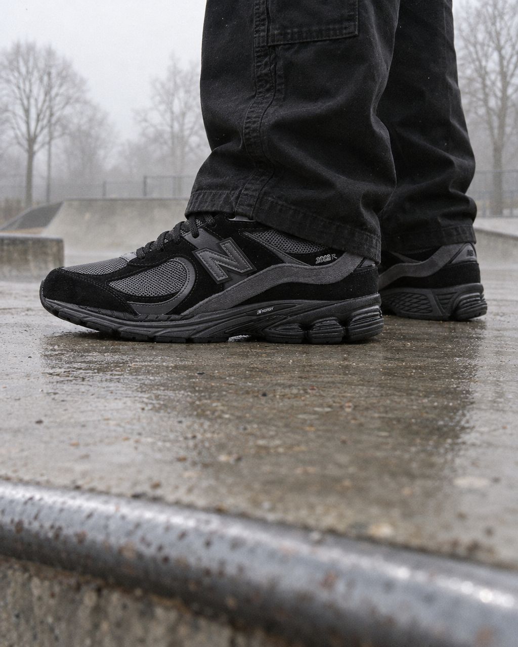 New Balance 2002R Black Dark Grey - on-foot