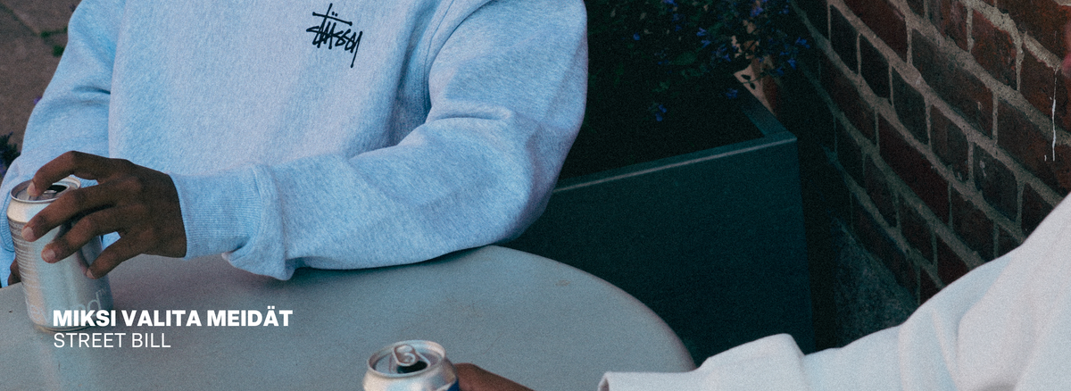 Miksi valita meidät – Street Bill Stüssy-paita ja juomatölkit.